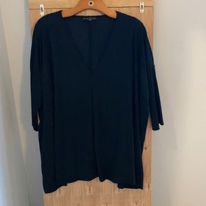 Black v-neck blouse. 73%nylon 27%elastane.